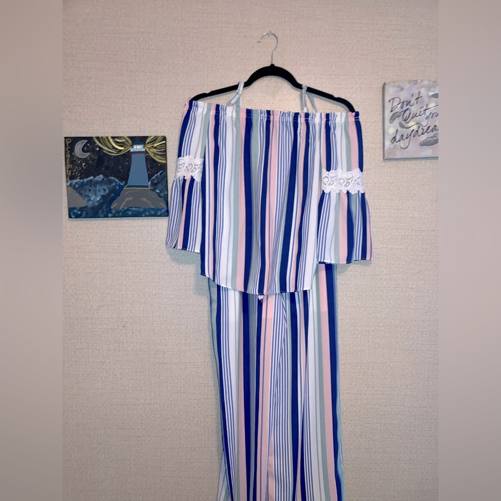 It’s a Kids Top and bottom set by Amy Bear in a kids Large